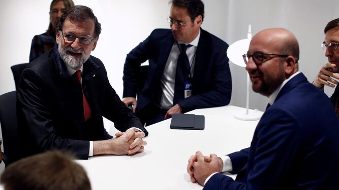 Mariano Rajoy y Charles Michel (dcha.)
