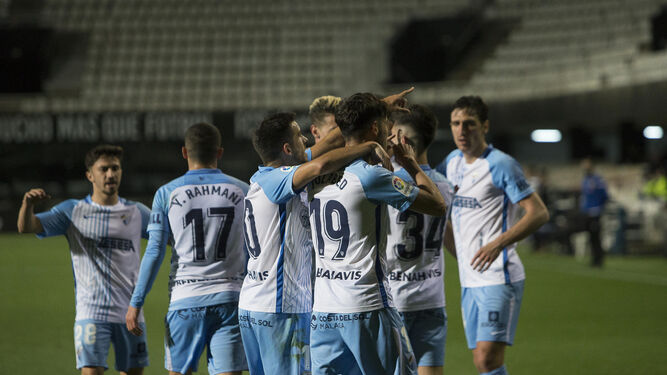 Los jugadores del Málaga CF celebran un gol en un partido reciente.